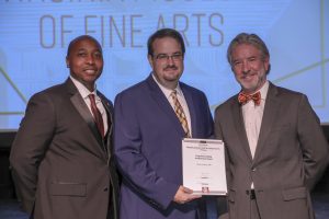 Kevin Jones Accepts Certificate